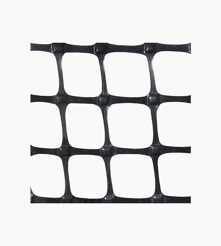 Géogrille BX3000 Soleno déroulée sur sol de chantier avec détails de la texture