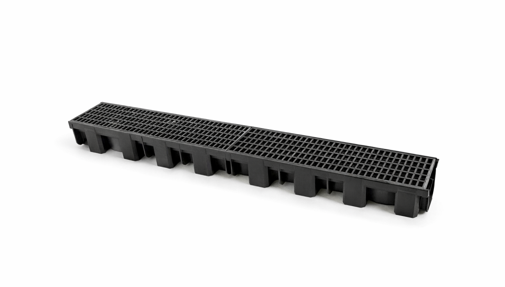 Caniveau TOP X Hauraton 1 m polypropylène avec caillebotis noir sur fond neutre