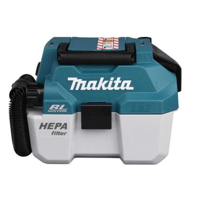 Aspirateur portable sans fil Makita DVC750LZ 18 V LXT photographié sur fond neutre avec vue de son réservoir et filtre HEPA.