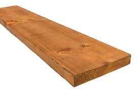 Bois traité brun Bossinotte Lumber 2 po x 10 po x 16 pi sur fond neutre avec mise au point sur la longueur et la solidité