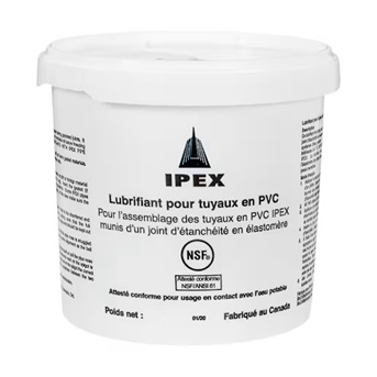 Lubrifiant IPEX pour joints de tuyaux PVC 4 kg sur fond blanc mise au point sur la texture.