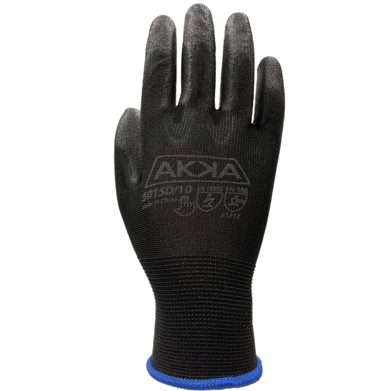 Gant en polyester et carbone noir modèle G10 enduit de PU et compatible tactile photographie sur fond neutre avec mise au point sur la texture